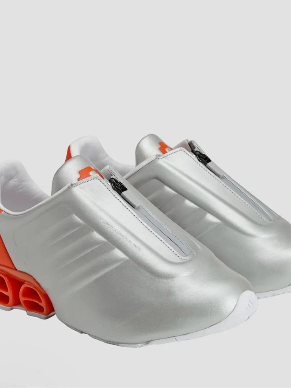Men's Silver Athletic Sneakers with Orange Accent